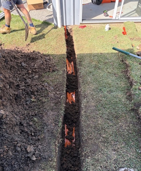 Cable laid in an open trench in red soil